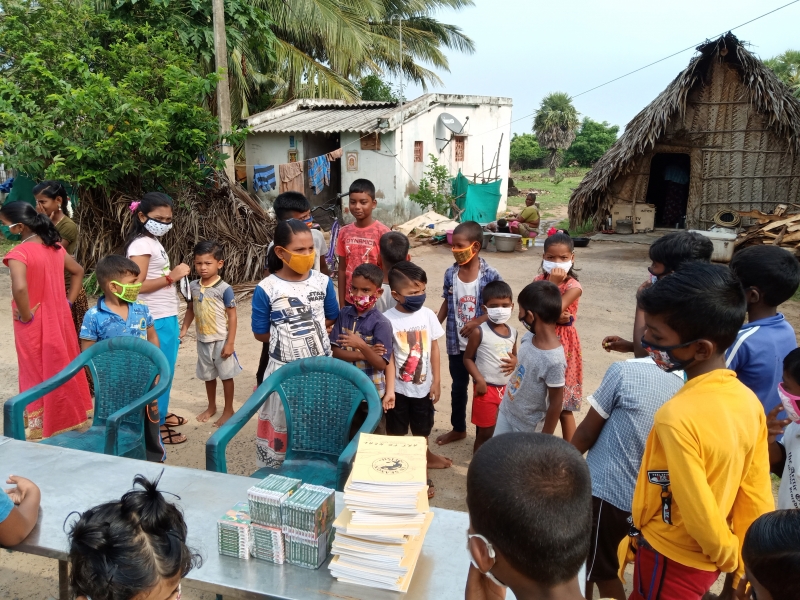 Distribution of outreach material to children from fishing communities