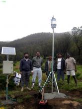 Installing the ill-fated automatic weather station.