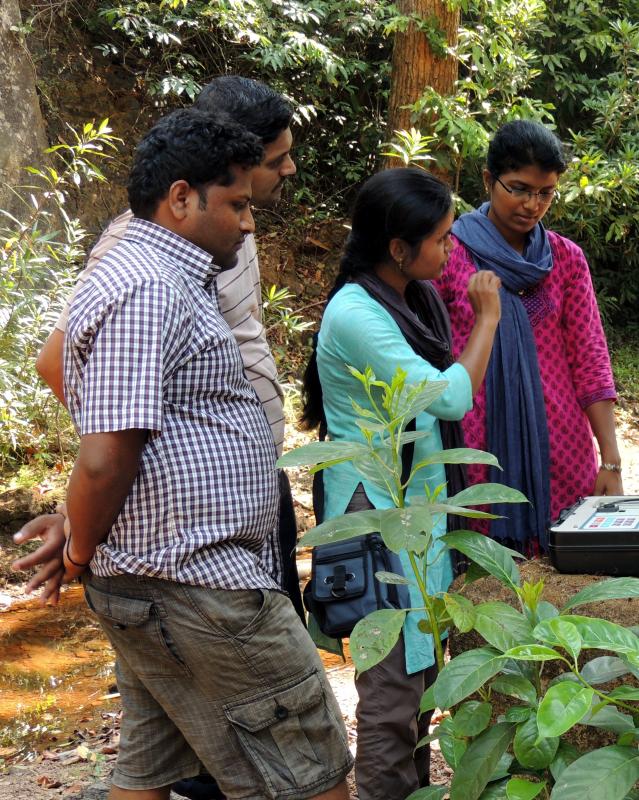 Testing a water sample at Saimane in the Aghnashini basin.